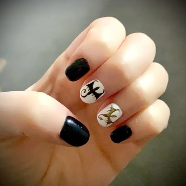 Raven’s Wing Nail Design