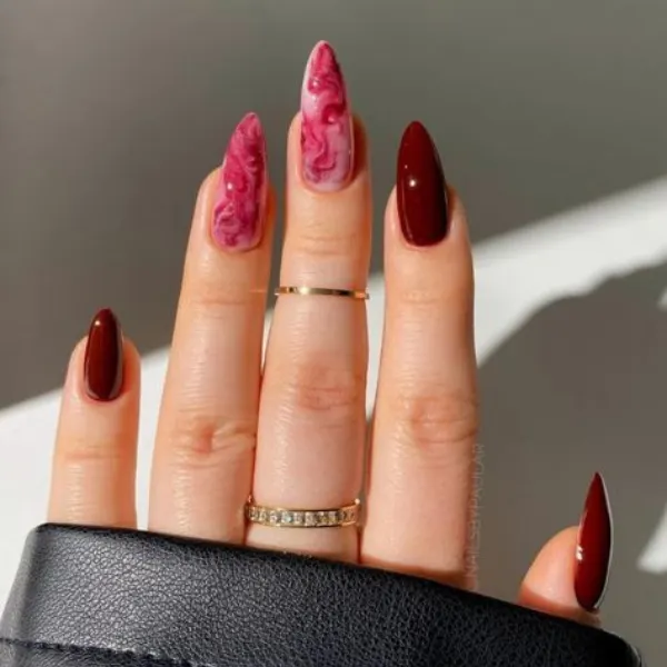 Crimson Swirl Almond-Shaped Nails Design